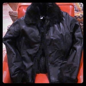 Black leather coat with faux fur lining.